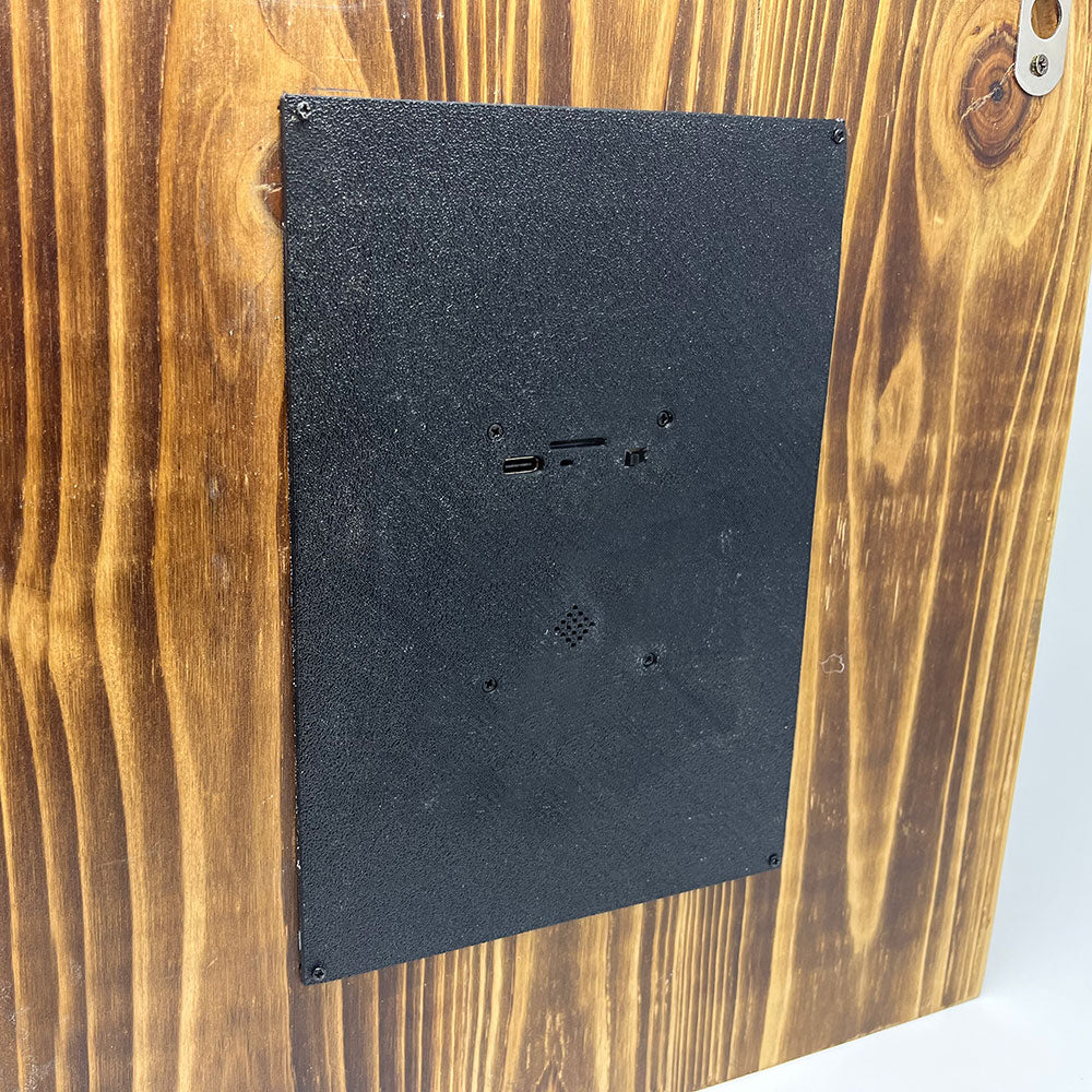 Back Side where SD Card goes Close up View Discreet wood frame décor with built-in motion-activated camera