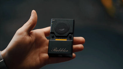 NG-3000I The Rabbler White Noise Generator Held In a Hand