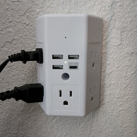 multi-outlet wall tap camera — in use