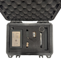 EOP kit in an open foam case with a DD902 detector, a small two-button tool, batteries, and two slim tools