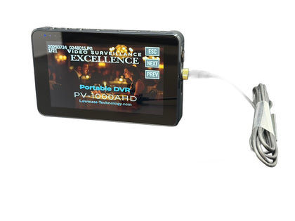 Lawmate PV-1000AHD portable DVR powered on with connected covert camera showing surveillance footage on 5-inch touchscreen