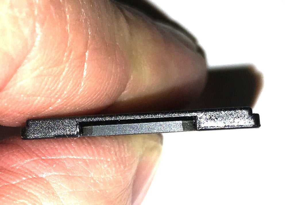 SD card inserted into adapter