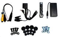 Lawmate BU-19 button camera and accessory pack showing all visible parts of the package.  Extra buttons, scews, bolts, battery pack, analog splitter cable, 9v battery holder case, and camera with microphone and microphone lapel clip. 
